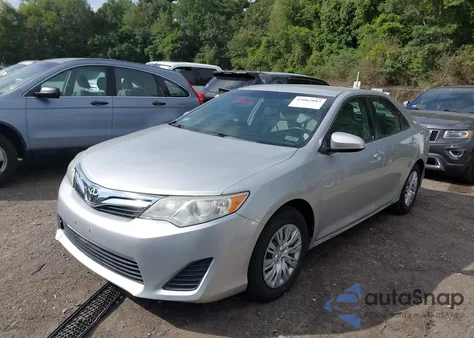 2014 Toyota Camry Le z USA, uszkodzony, nr VIN 4T4BF1FK7ER382583